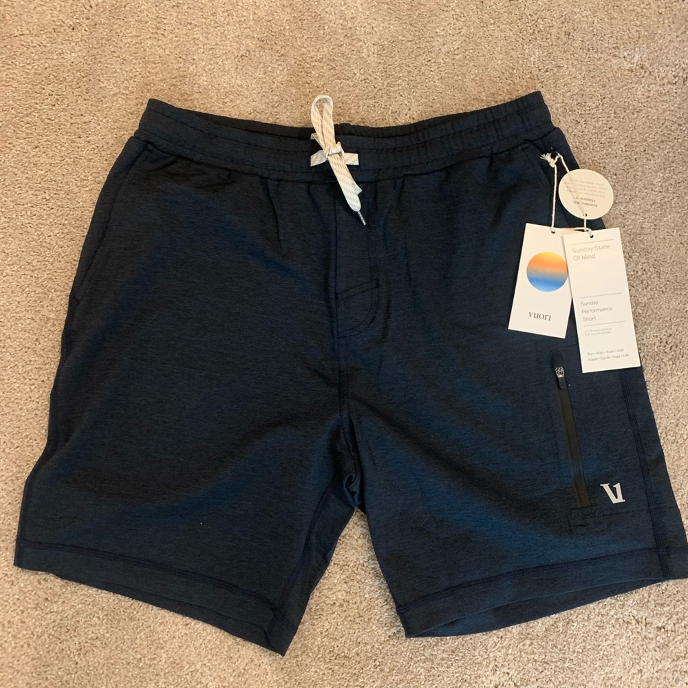 Vuori Sunday performance short. Size medium. New with tags